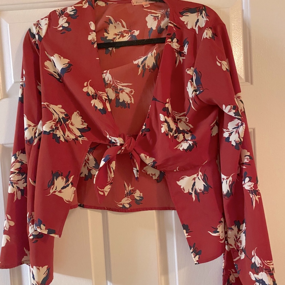 Red blouse with tie in front